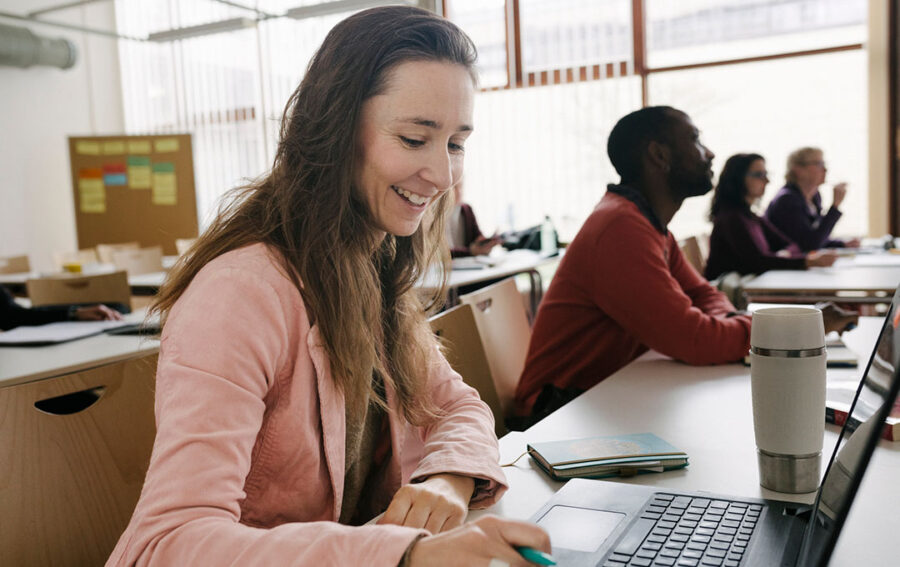 student looking at the laptop