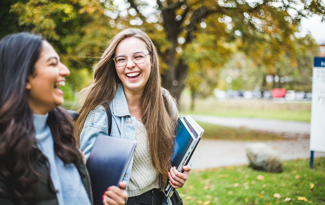 students walking and laughing