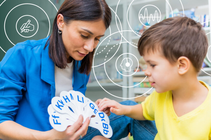 Adult teaching child with flashcards
