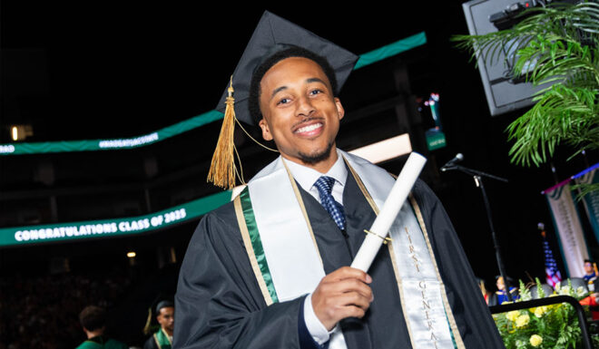 student in graduation gown