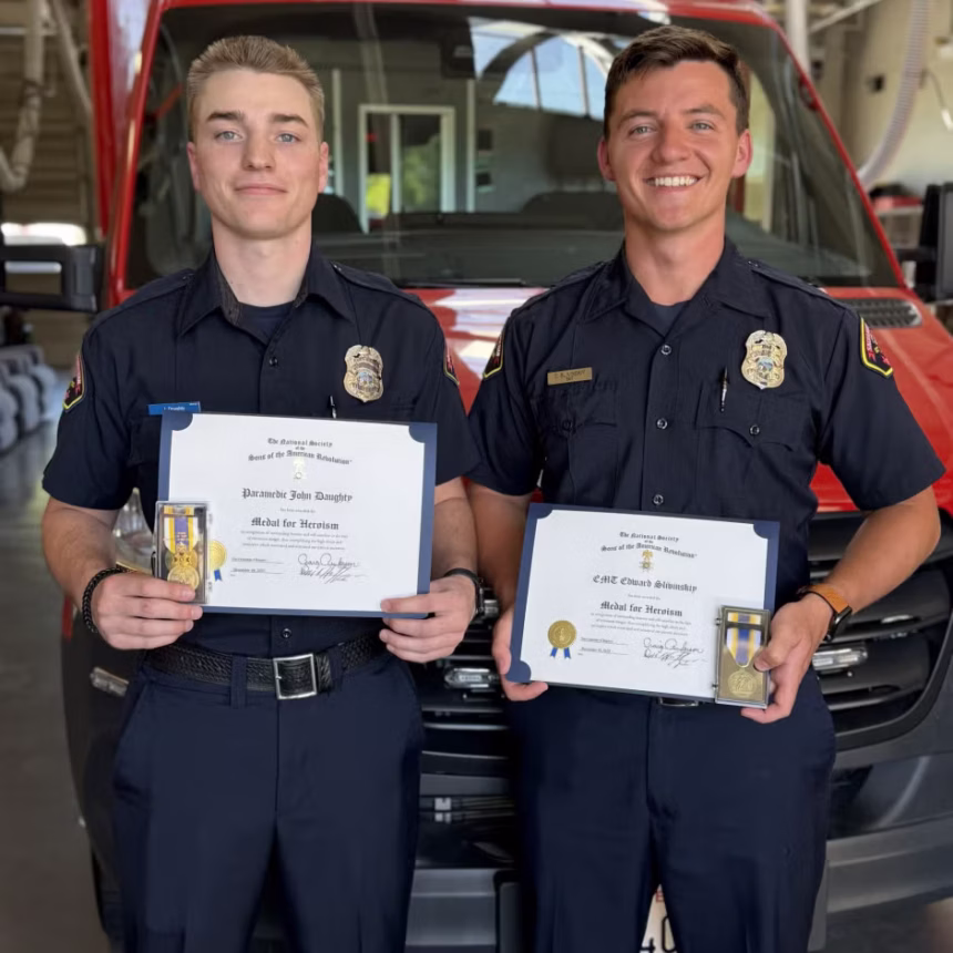 Photo of Paramedic John Doughty [left] and EMT Edward Slivinskiy [right]